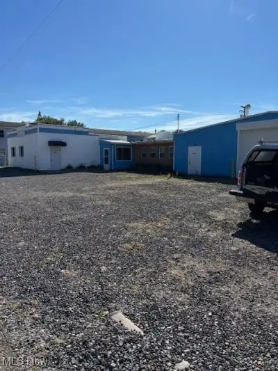 Multi-parcel Commercial Property with Storage and Rustic Office Space on 0.76 Acres