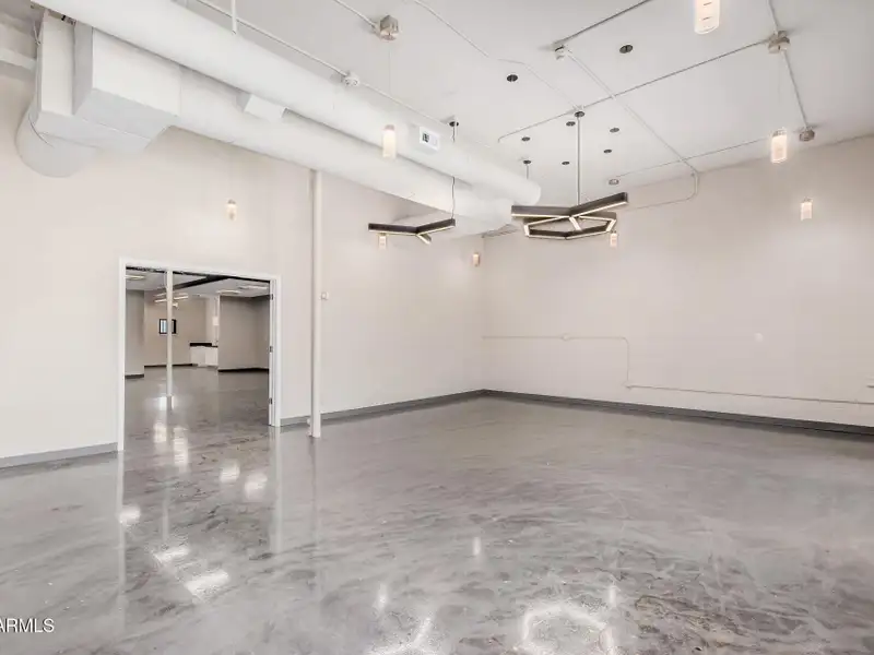 Versatile Commercial Property with Two Buildings and Ample Parking in Prime Location