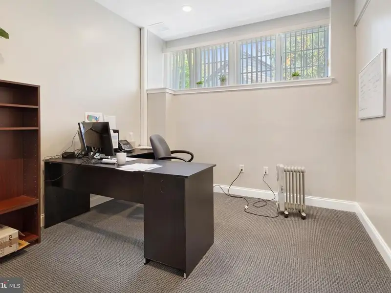 Historic 1921 Office Building in Wallingford with Ample Parking and Strong Investment Potential