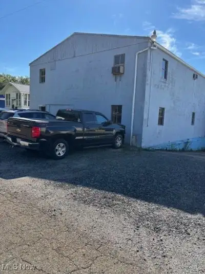 Multi-parcel Commercial Property with Storage and Rustic Office Space on 0.76 Acres