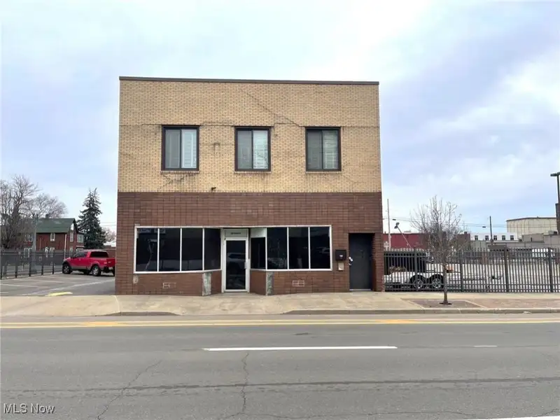 Well-maintained Two-story Brick Building with Retail and Workshop Space in Ne Location