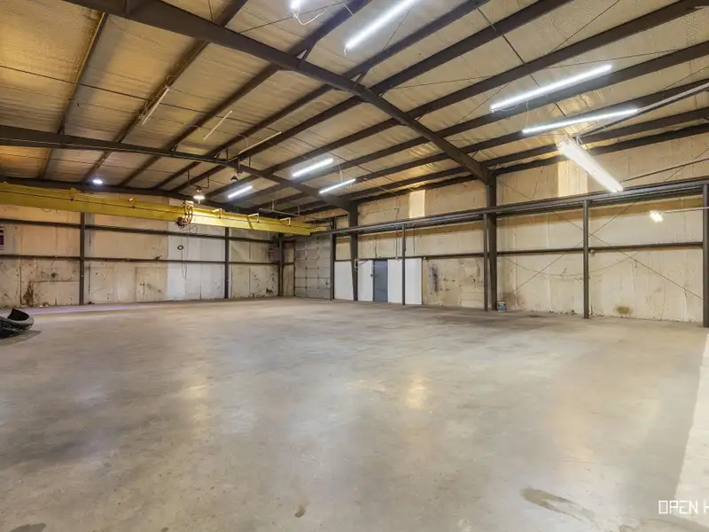 Insulated Warehouse and Office Space with Crane, Fenced Yard in Prime Location