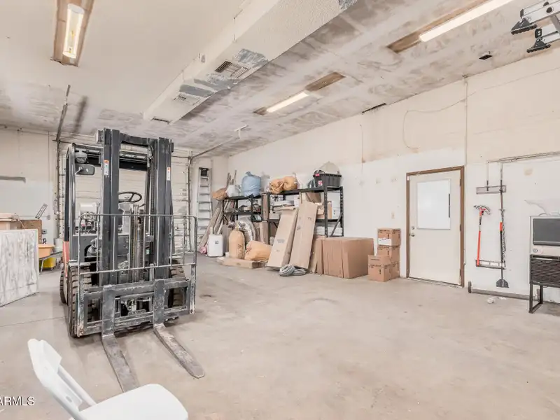 Versatile Commercial Property with Two Buildings and Ample Parking in Prime Location