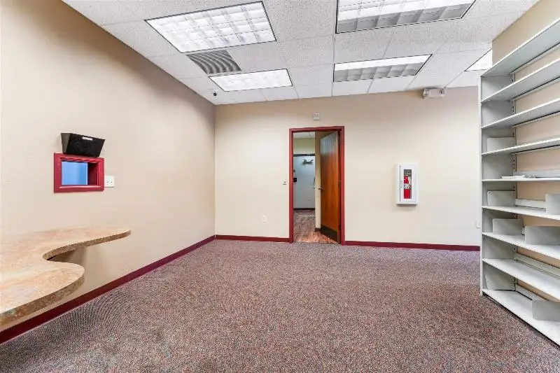 Versatile Commercial Condo for Sale Near Hwy 151 & 41 with Multiple Offices and Amenities