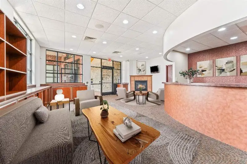 Versatile Commercial Condo for Sale Near Hwy 151 & 41 with Multiple Offices and Amenities