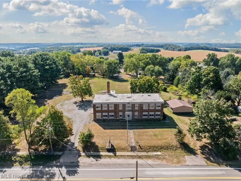 Versatile Two-story Brick Building on Almost 3 Acres with Gym and Classrooms
