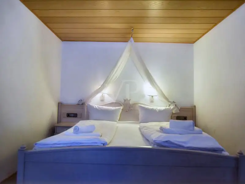 Historic Family-run Hotel in Ansbach with Restaurant, Guest Rooms, and Green Energy Features
