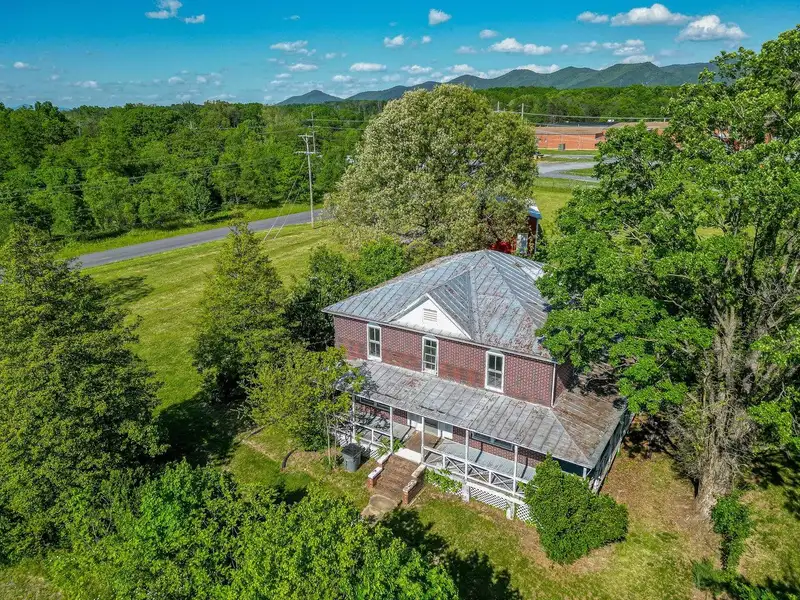 Classic American Foursquare Home in Need of Restoration with Detached Garage