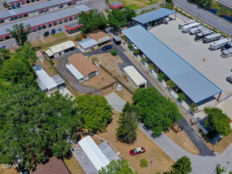 Mixed Use Property: Light Industrial Lot with Adjoining Residential Home and Expansion Potential