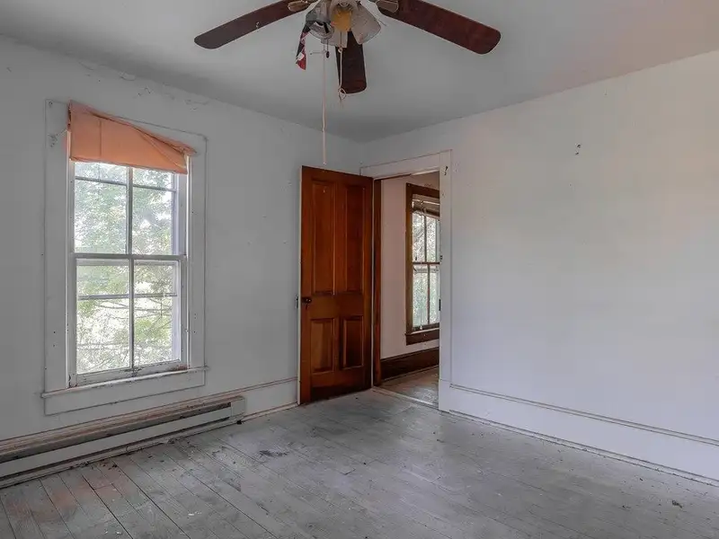 Classic American Foursquare Home in Need of Restoration with Detached Garage