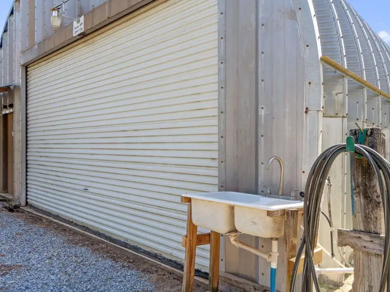 30x30 Enclosed Quonset Building with Pole Barn and Storage on Hwy 98