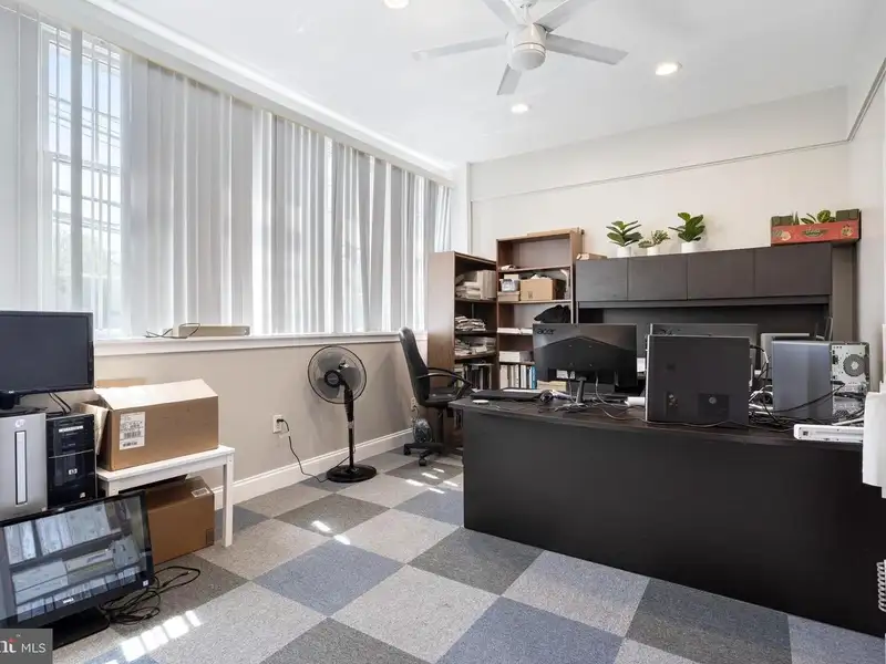 Historic 1921 Office Building in Wallingford with Ample Parking and Strong Investment Potential