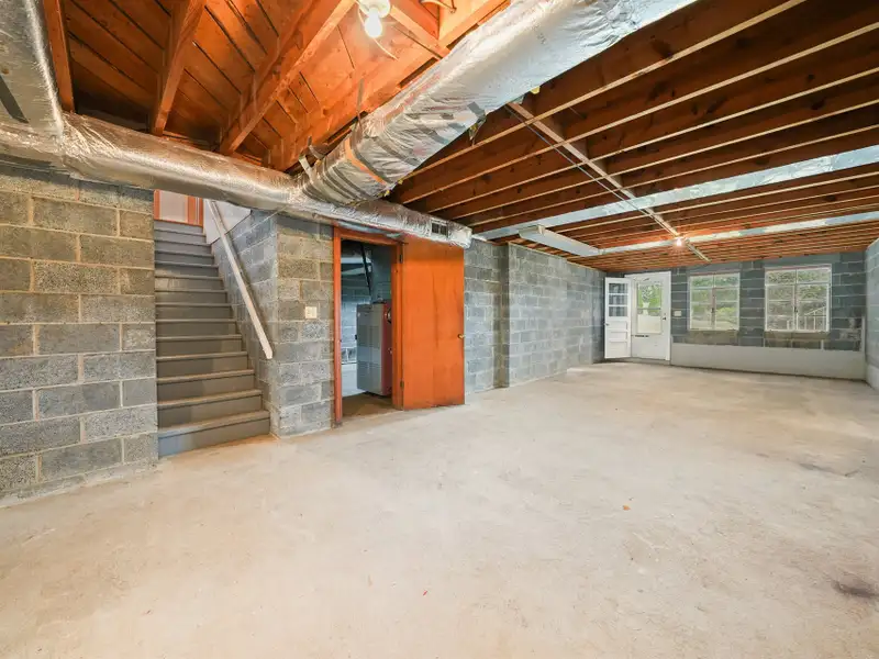 Prime 2.58-acre Multifunctional Property with Ranch Home and Outbuildings Near High-traffic Area