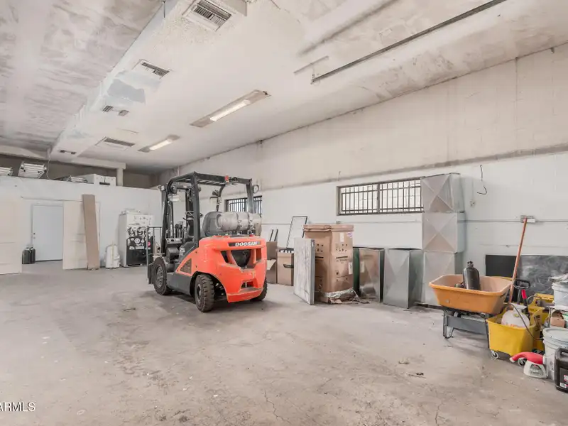 Versatile Commercial Property with Two Buildings and Ample Parking in Prime Location