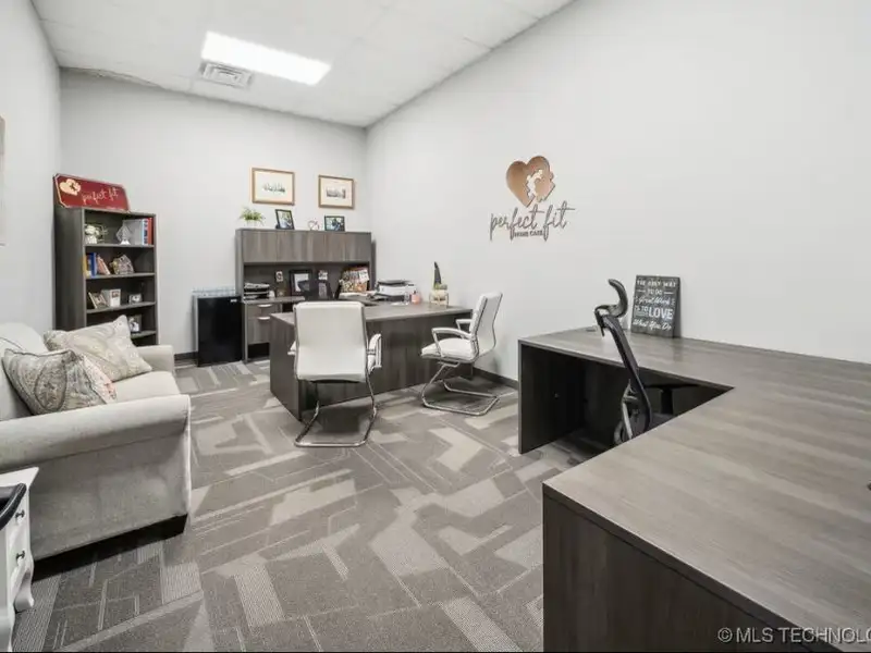 Historic Office Building with 9 Private Suites and Conference Room in Prime Location