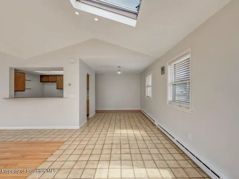 Mixed-use Property in Throop: 7-bay Garage and Updated 2-bedroom Apartment
