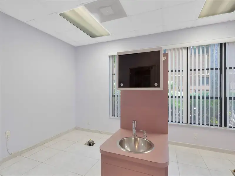 End Unit Tri-plex Commercial Space with Parking in Prime Location