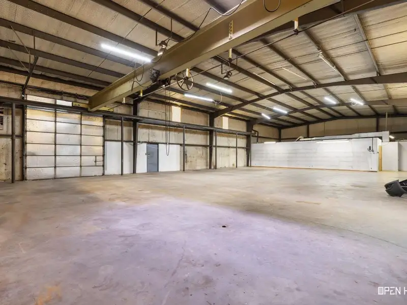 Insulated Warehouse and Office Space with Crane, Fenced Yard in Prime Location