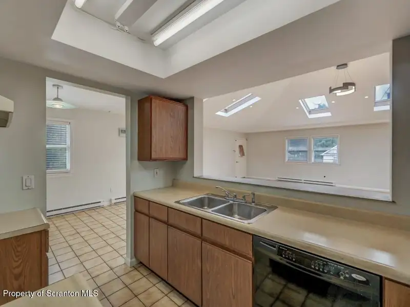 Mixed-use Property in Throop: 7-bay Garage and Updated 2-bedroom Apartment