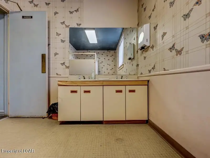 Versatile Downtown Hazleton Building: Former Worship Space with Offices/classrooms Potential