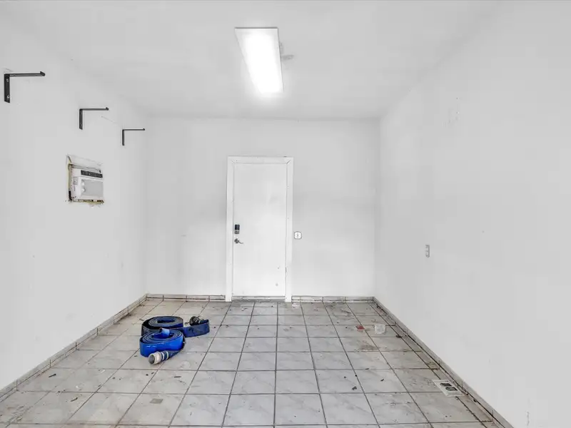 Commercial Property with Office Space and Residential Unit in Industrial Area