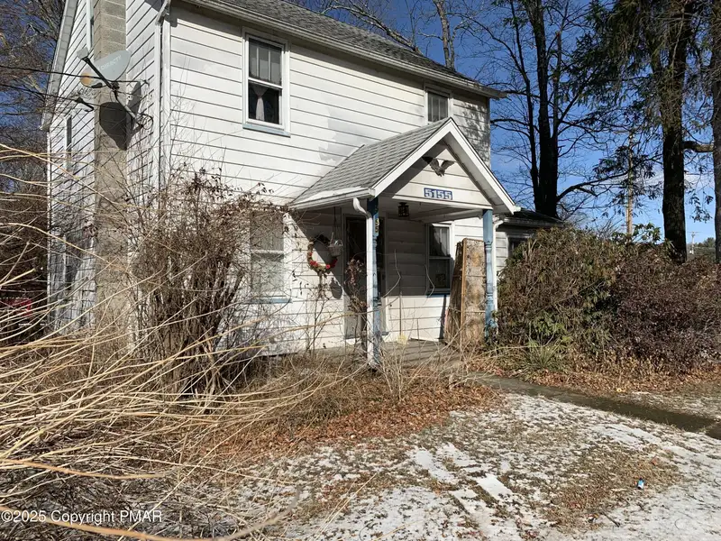 Prime 2-acre Commercial Property with 3-bedroom Home in High Traffic Area