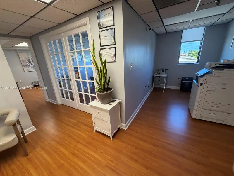 Well-maintained Office Space Near Coral Gables with Natural Light and Three Private Rooms