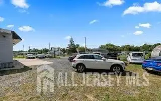 Turnkey Automotive Business with Car Dealership, Mechanic & Auto Body Shop in Prime Location
