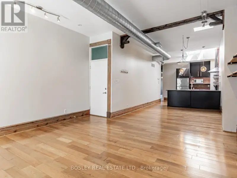 Charming Two-storey Apartment in Landmark Building on Queen St West
