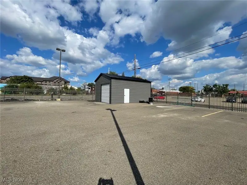 Well-maintained Two-story Brick Building with Retail and Workshop Space in Ne Location