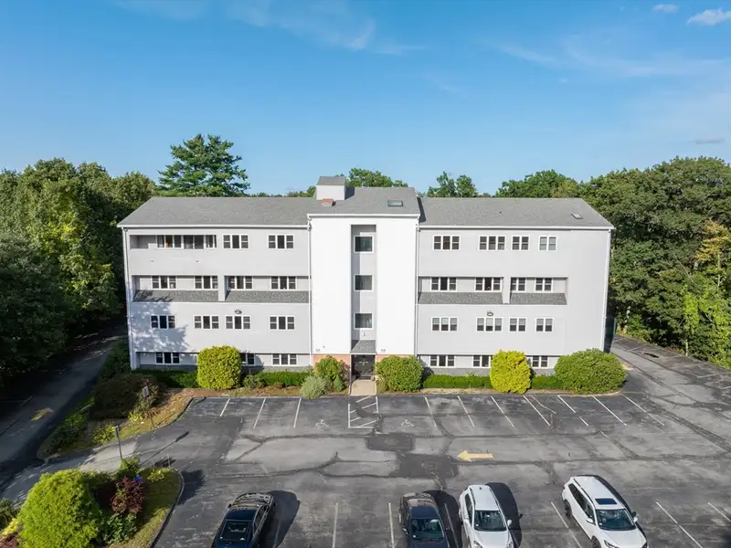Freestanding Four-story Office Building with Parking on Route 114, North Andover