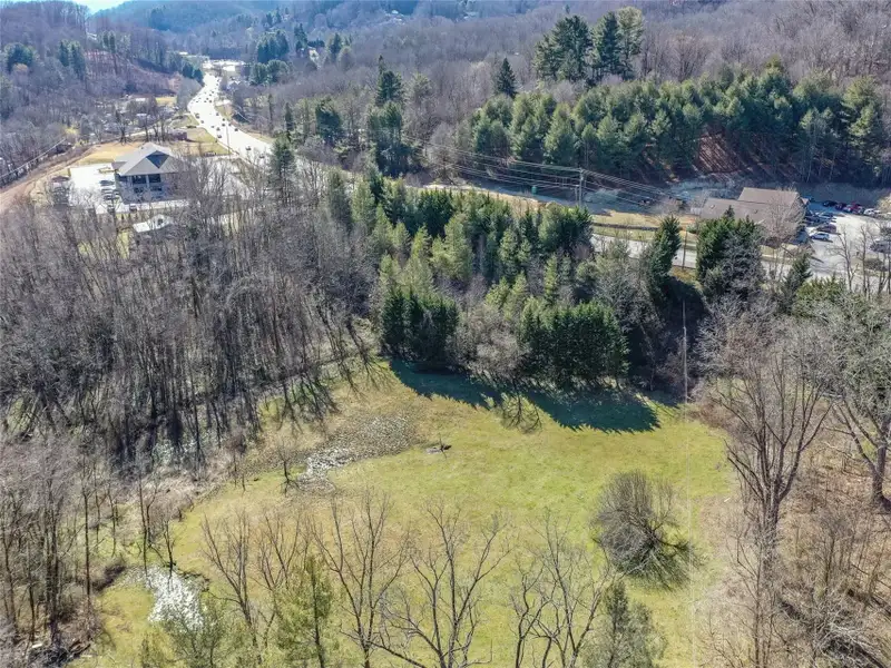 9.29 Acre Multi-family or Commercial Parcel in Waynesville Etj with City Utilities