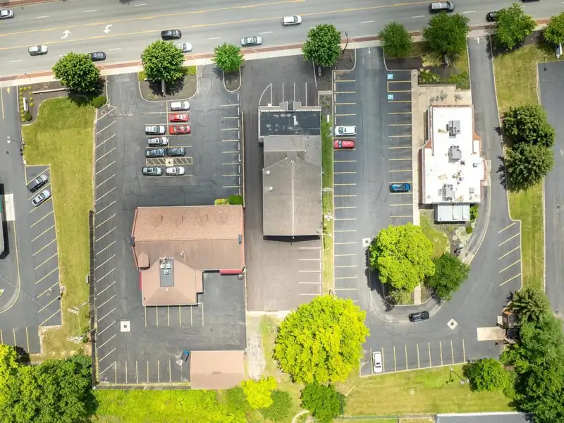 Prime Commercial Building in Downtown Reynoldsburg with Parking and Industrial Garage