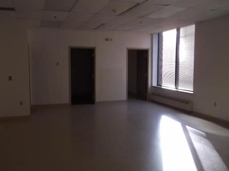 14,000 Sf Two-story Building in Omro with 20+ Rooms and Parking Lot Available