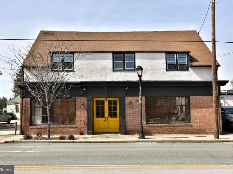 Mixed-use Commercial Property with Office, Garage, and Apartment in Flourtown