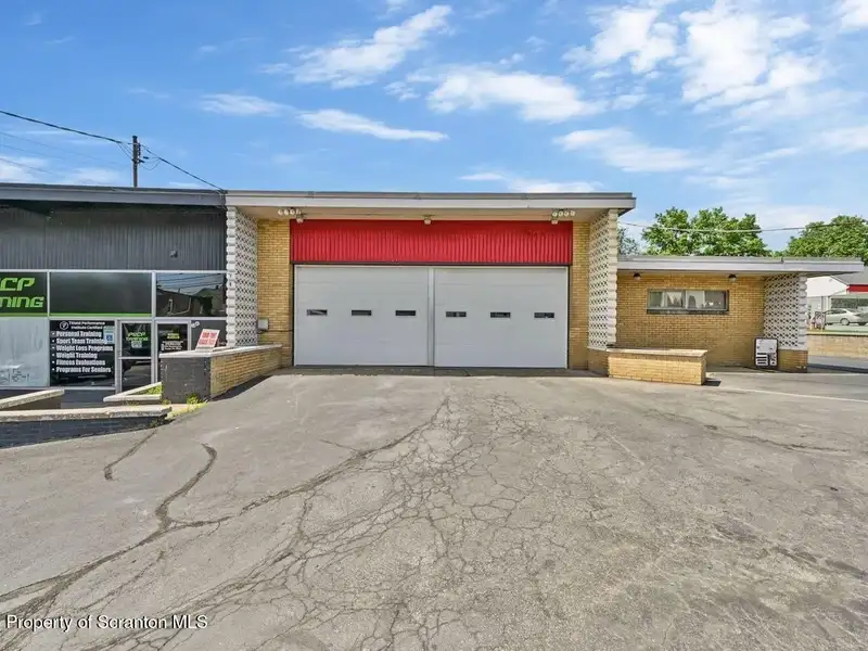 Mixed-use Building with Retail Space and Parking for Sale in Prime Location