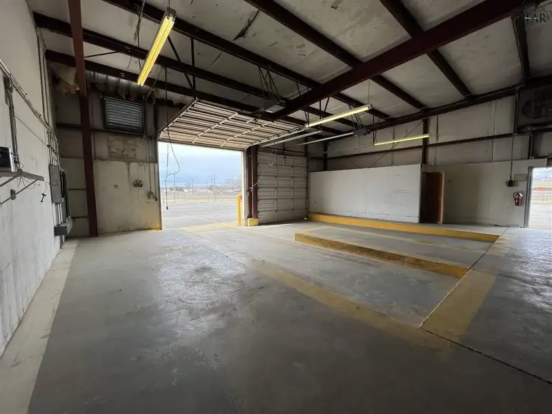 Warehouse Space with Offices and Loading Docks on 1.5 Acres, Convenient Location
