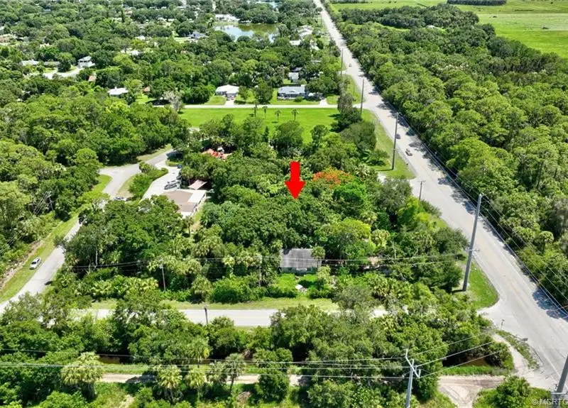 Commercial Corner Lot with Existing Residence in Lakewood Park, 31,140 Sq Ft