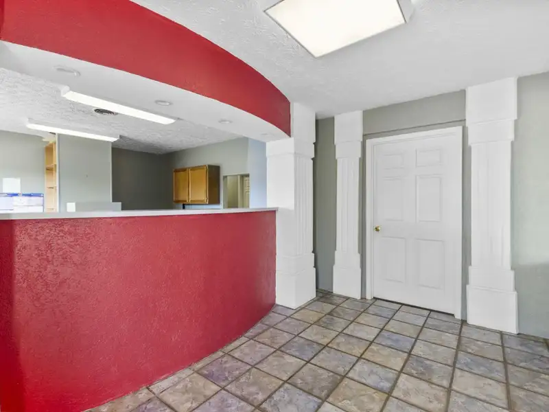 Versatile 4,305 Sq Ft Office Building with Apartment on Highway 11e
