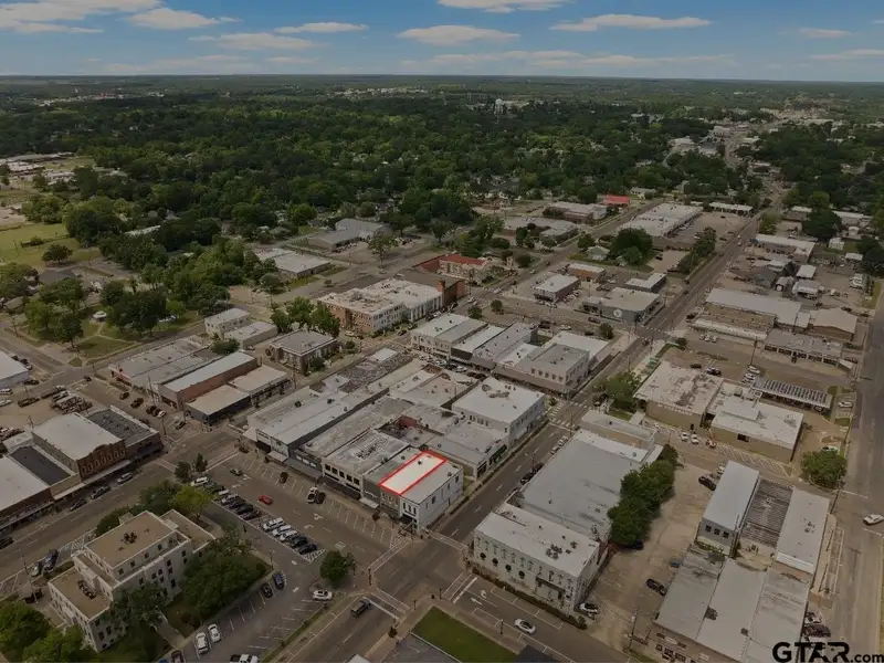 Unfinished Downtown Commercial Building with High Traffic Visibility and Mixed-use Potential