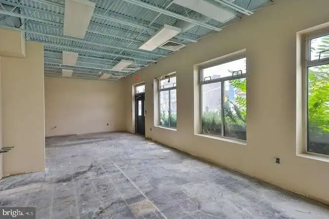 Versatile 6,000 Sq Ft Commercial Space in Prime Location with Parking Potential