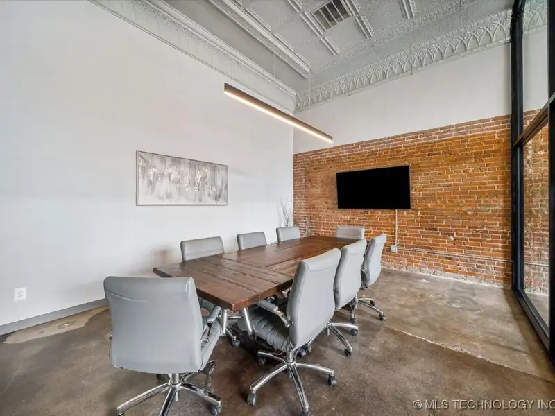 Historic Office Building with 9 Private Suites and Conference Room in Prime Location