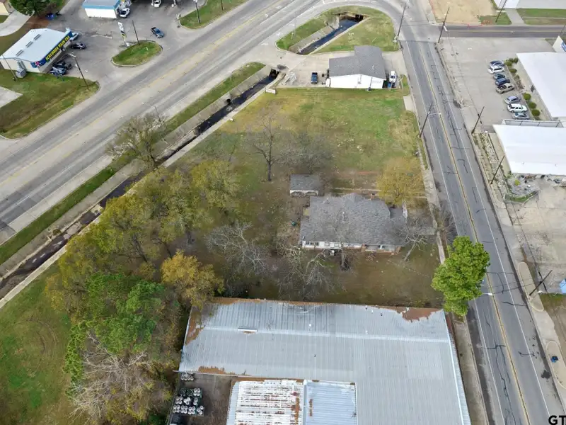 Prime Commercial Property with Building and Home on Half Acre Lot
