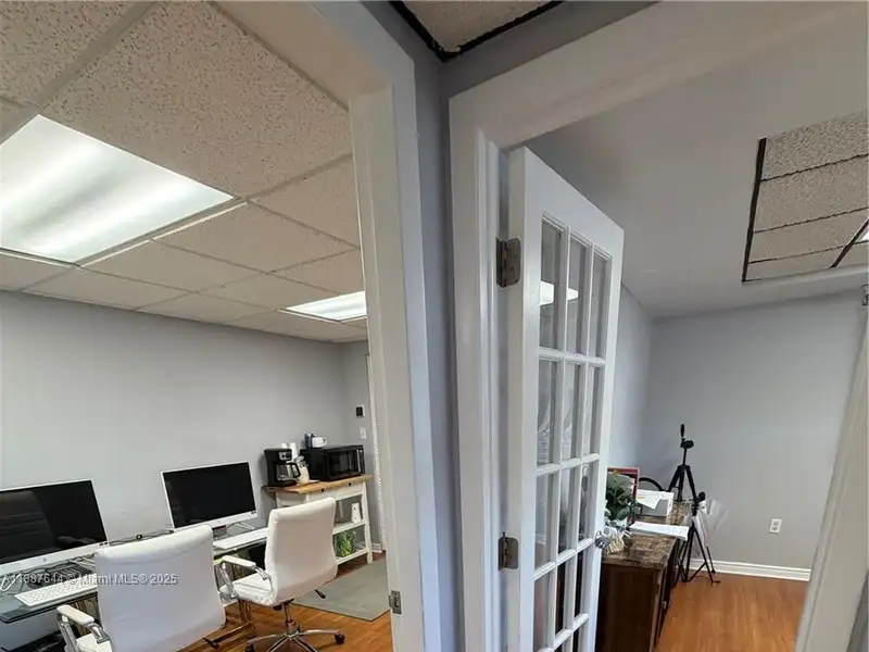 Well-maintained Office Space Near Coral Gables with Natural Light and Three Private Rooms