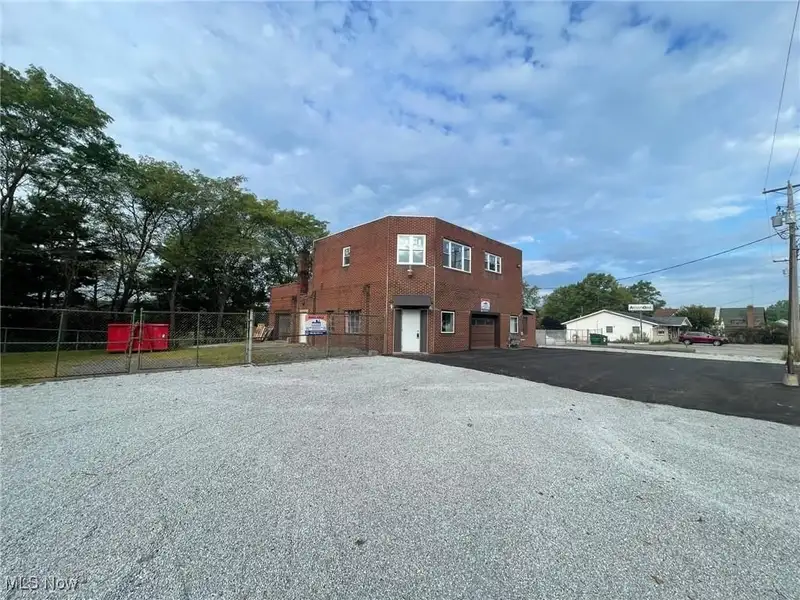 Updated Mixed-use Brick Building with Retail and Office Space in Prime Location