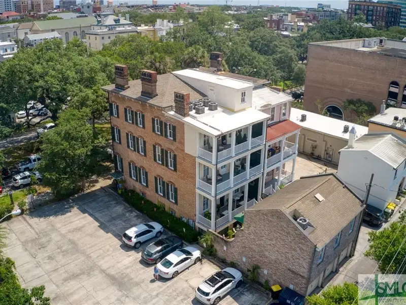 Restored 1871 Gray Brick Townhome in Savannah’s Historic District with Carriage House and Stvr Certificates