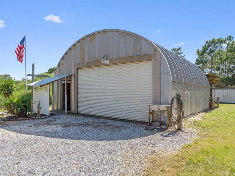 30x30 Enclosed Quonset Building with Pole Barn and Storage on Hwy 98