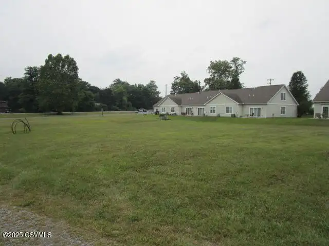 Partially Built Condo Development with Approved Plans in Picturesque Location