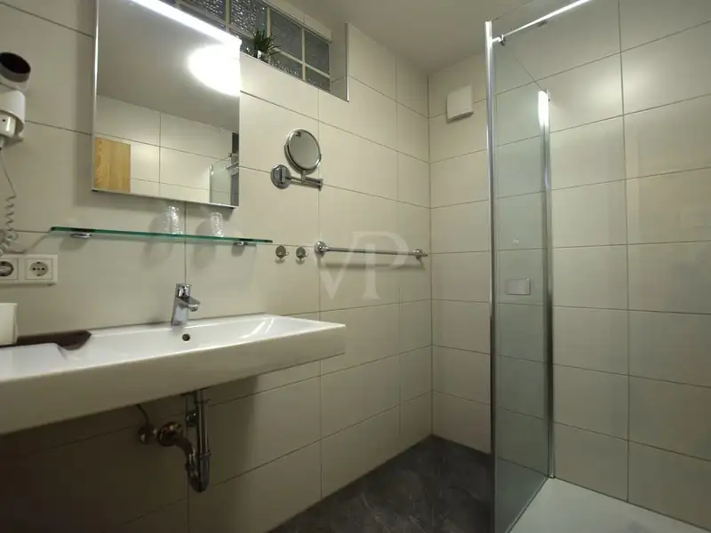 Historic Family-run Hotel in Ansbach with Restaurant, Guest Rooms, and Green Energy Features