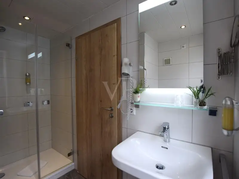 Historic Family-run Hotel in Ansbach with Restaurant, Guest Rooms, and Green Energy Features